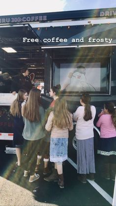 people are lined up to get coffee and frosty at the ice cream truck outside