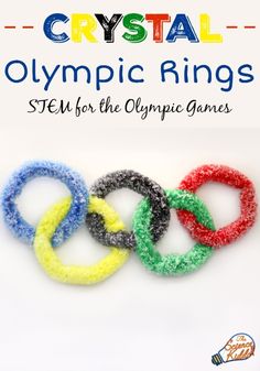 four olympic rings with the title crystal olympic rings stem for the olympic games on it
