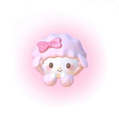 a pink and white stuffed animal with a bow on it's head, sitting in the air