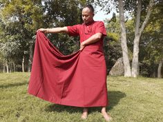 TIBETAN BUDDHIST MONK'S MEDITATION SKIRT/ BODY WRAP NamasteYOGAstore presents this unisex meditation skirt suitable for both men and women. It consists of two items. The first is Buddhist Monk Meditation Skirt and the second is Buddhist Monk Robe Belt. BUDDHIST MONK MEDITATION SKIRT: Made from pure cotton, this Tibetan Buddhism Lama Monk Maroon Skirt is called The Shamthap. It is mainly used during prayers and meditation. It is made in Refugee Centre in Delhi by our Tibetan tailor. HISTORY AND S Buddhist Monk Robes, Monk Meditation, Nun Costume, Maroon Skirt, Body Wrap, Buddhist Monk, Body Wraps, Tibetan Buddhist, Yellow Stripes