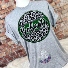 a t - shirt with the word eagles on it and a leopard print in the middle