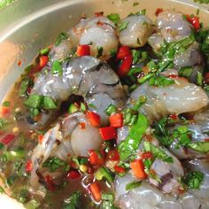 shrimp and vegetable stir fry in broth with red peppers, cilantro and green onions