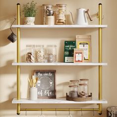 three shelves with jars and other items on them