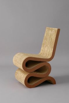 two wooden chairs stacked on top of each other