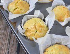 some muffins are sitting on a baking tray