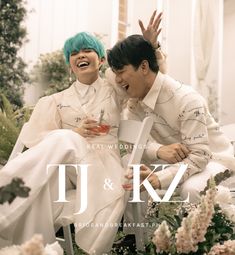 two people sitting next to each other in front of flowers and plants with the words j & k written on them