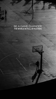 a man is playing basketball on an outdoor court with the words be a game changer, the world is full of players