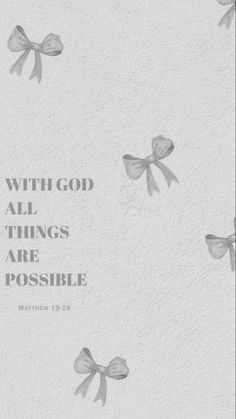 the words with god all things are possible on a white wall and bow tie around it