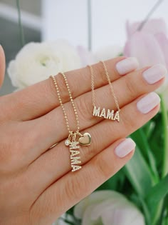 The Diamond Mama Necklace makes for the perfect gift for all moms and mom-like figures. Featuring .11 carats of diamond set in block letters spelling out "mama," this necklace is a sweet, sparkly addition to any layer. Aesthetic Chains, Name Tag Necklace, New Mama Gift, Mom Trends, Nose Piercing Ring, Initial Earrings Studs, Mommy Necklace, Meaningful Necklace, Choker Handmade