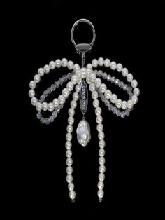 Composition : faux pearl, beads, and surgical steelCountry of Origin : Republic of Korea Pearl Ribbon, Baroque Pearls, Pearl Beads, Key Rings, Faux Pearl, Bag Accessories, Composition, Ribbon, Bag Lady