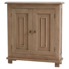 a wooden cabinet with two doors and drawers