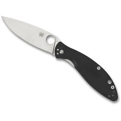 a knife that is on top of a white surface with holes in the blade and black handle