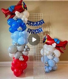 balloons are arranged in the shape of airplanes