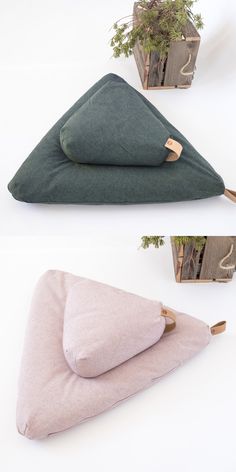 two pillows and a potted plant are shown in three different positions on the same surface