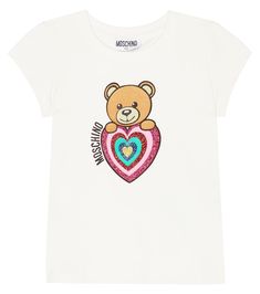 Treat your little one to this adorable T-shirt from Moschino Kids. The crewneck style features the brand's beloved teddy bear motif embellished with a glittery, multicolored heart. | MOSCHINO BAMBINO Glitter logo printed T-shirt Moschino Teddy Bear Logo, Glitter Logo, Moschino Crop Top, Moschino T Shirt, Moschino Kids, Crewneck Style, Playful Multicolor Unicorn Print T-shirt, Pink Cotton T-shirt With Unicorn Print, Girls Tees