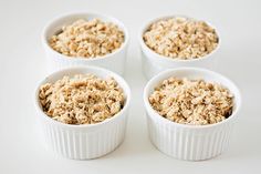 four small white bowls filled with oatmeal