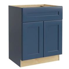 a blue cabinet with two doors and one drawer on the bottom, in front of a white background