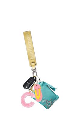 a keychain with a cell phone hanging from it's side and a camera attached to it