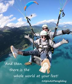 a man flying through the air while riding a parachute