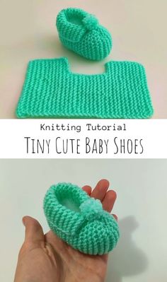 a hand is holding a knitted baby shoe and it's cover in green yarn