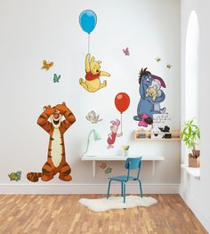 winnie the pooh and tigger wall decals in a child's room