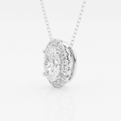 One of the hottest shapes this year, the Oval, makes an instant upgrade with gorgeous round lab grown diamonds framing it delicately. We believe this will soon be your everyday fave and an instant hit with anyone who lays eyes on it! Luxury Oval Pendant Jewelry With Halo Detail, Luxury Oval Moissanite Necklaces, Oval Diamond Pendant, Diamond Frame, Halo Pendant, Diamond Halo, Oval Diamond, Halo Diamond, Diamond Pendant