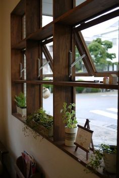 a window with some plants in it