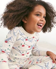 Long John pajama set in our legendary soft organic cotton rib knit, complete with cheerful holiday print fit for every festive moment. • Hypoallergenic & eczema-friendly • Sensory-friendly scratch-free seams that lay flat on the skin • Like new wash after wash • OEKO-TEX® STANDARD 100 certified safe from hundreds of harsh chemicals 100% organic combed cotton rib knit Super-smooth flatlock seams Encased elastic waistband Foldable cuffs for a lasting fit OEKO-TEX® STANDARD 100 | 03.U.9375 HOHENSTE Playful Cotton Sleepwear For Winter, Holiday Playful Sleepwear, White Winter Tops For Lounging, Playful Long Sleeve Sleepwear For Holidays, Playful Cotton Holiday Sleepwear, Playful Holiday Cotton Sleepwear, Playful Cotton Sleepwear For Holidays, Playful Crew Neck Winter Sets, Playful Winter Sets With Crew Neck