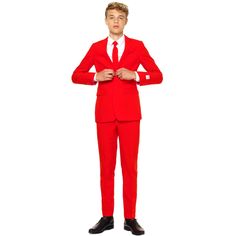 a man in a red suit is standing with his hands on his hips