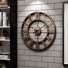 a large clock mounted to the side of a brick wall next to a bookshelf