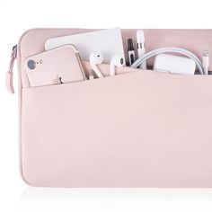 an open pink laptop bag with various electronics in it's pocket, on a white background