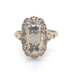 Antique Opal Ring, Vintage Sapphire ring, 14k Yellow Gold, Vintage Ring, Antique jewelry, Estate jewelry, vintage opal jewelry, jewelry gift Jewelry Yellow Gold 14k  (the gold has been tested by a professional) Total Carat Weight:0.28ct (Approx.) Total Metal Weight: 2.4g Size:6 US \ 16.51 mm (inner diameter) Vintage 14k Stamped Opal Ring For Formal Occasions, Antique 14k Gold Moonstone Wedding Ring, Vintage Multi-stone Opal Ring For Formal Occasions, Vintage Multi-stone Yellow Gold Opal Ring, Antique Gold Opal Ring With Multi-stones, Antique Gold Multi-stone Opal Ring, Victorian 14k Gold Moonstone Ring For Anniversary, Vintage Hallmarked Opal Ring For Anniversary, Heirloom Opal Ring In 14k Gold