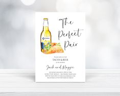 a bottle of beer next to a card with the words the perfect pair on it