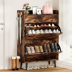 a wooden shoe rack filled with lots of shoes