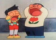 two cartoon characters standing next to each other in front of a wall with flowers on it