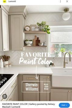 a kitchen with gray cabinets and white counter tops is featured on the instagram page