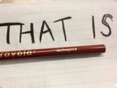 a pencil that is laying on top of a piece of paper with the word'thats'written in it