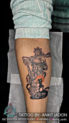 a person with a tattoo on their leg