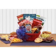 Honor and celebrate your pride with your family, friends, and everyone on your list with this true blue Proud to be An American patriotic gift basket! This gift tray is filled with delicious summer fun treats to salute Memorial Day, July 4th, or any day this summer. This gift includes: Red gift tray, Proud To Be An American Spicy snack mix, classic cheddar cheese 2 oz wedge, 5 oz Bavaria summer sausage, Mrs. Fields classic chocolate chip cookie, White cheddar harvest crisp snacks, 3 oz Cajun waffle pretzels, Parmesan Crips cheese bites, wrapped in cellophane and topped with a handmade bow Patriotic Snacks, Pea Snacks, Snack Gift Baskets, Mrs Fields, American Snacks, Proud To Be An American, Summer Sausage, Gift Tray, Cajun Cooking