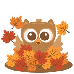 an owl sitting on top of leaves with eyes wide open