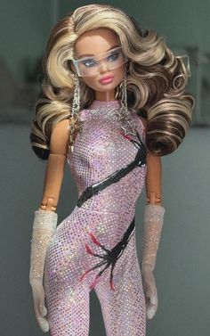 a barbie doll with long blonde hair and glasses on her head, wearing a purple bodysuit