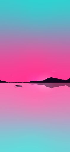 the sky is pink and blue as it reflects in the water