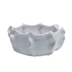 a white bowl that is shaped like an elephant's head on a white background