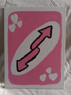 a pink and white painting with hearts on it