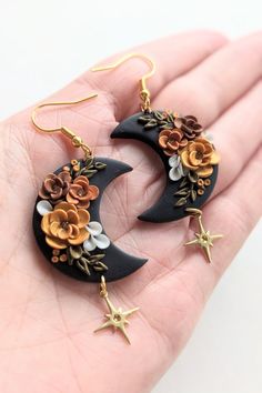 Handmade Black and Gold Floral Moon Earrings Made From Polymer Clay, Lightweight Dangles, Unique Jewelry Gift, Celestial Gifts - Etsy Clay Moon, Floral Clay Earrings, Polymer Clay Embroidery, Celestial Gifts, Handmade Clay Jewelry, Floral Moon, Poly Clay, Unique Jewelry Gifts, Polymer Clay Diy