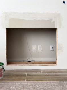 an electrical outlet is being installed in the corner of a room that's under construction