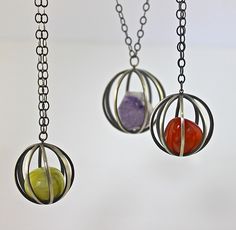 Gem Cages: Ashley Vick - lovely! Wire Cages For Stones, Caged Crystal Earrings, Stone Cage Necklace, Cage Wire Wrapping Stones, Cage Crystal Necklace, Beach Pebbles, Rock Necklace, Glass Furniture, Artful Home