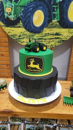 there is a tractor cake on the table