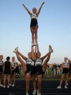 two cheerleaders on top of each other with the caption'oh you play football that's cute, we throw 100 pound girls & you throw 2 pound