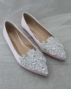 Chic satin pointy toe flats with rhinestone appliqué. Perfect simplicity for bride and wedding party. Detail:COLORS AVAILABLE: White, Ivory, Blush Pink, Champagne, Rose Gold Metallic, Aqua Blue and Royal Blue SatinUPPER: Synthetic upper and liningMATERIALS: Mandmade outsole STYLE NAME: VANITA Not sure of which size to purchase? Shoes measurements are as follow:(Please note measurements taken the length of inside of shoe from toe to heel) SIZE LENGTH Size 5.5: 9.25 inches Size 6: 9.5 inches Size Flat Wedding Shoes With Rhinestones, Embellished Pointed Toe Flats, Embellished Almond Toe Party Flats, Wedding Flats With Rhinestones And Flat Heel, Wedding Flats With Rhinestones, Elegant Pink Flats For Party, Elegant Pink Party Flats, Spring Wedding Flat Shoes Embellished, Embellished Flat Heel Wedding Shoes For Evening